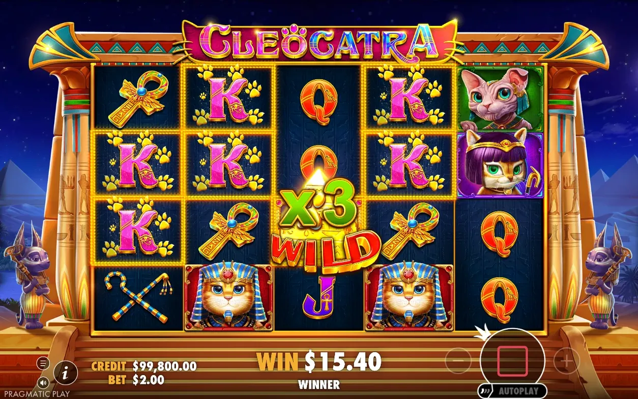 Rulli con wild x3 centrale, simboli K e paw print, vincita $15.40 indicata come Winner